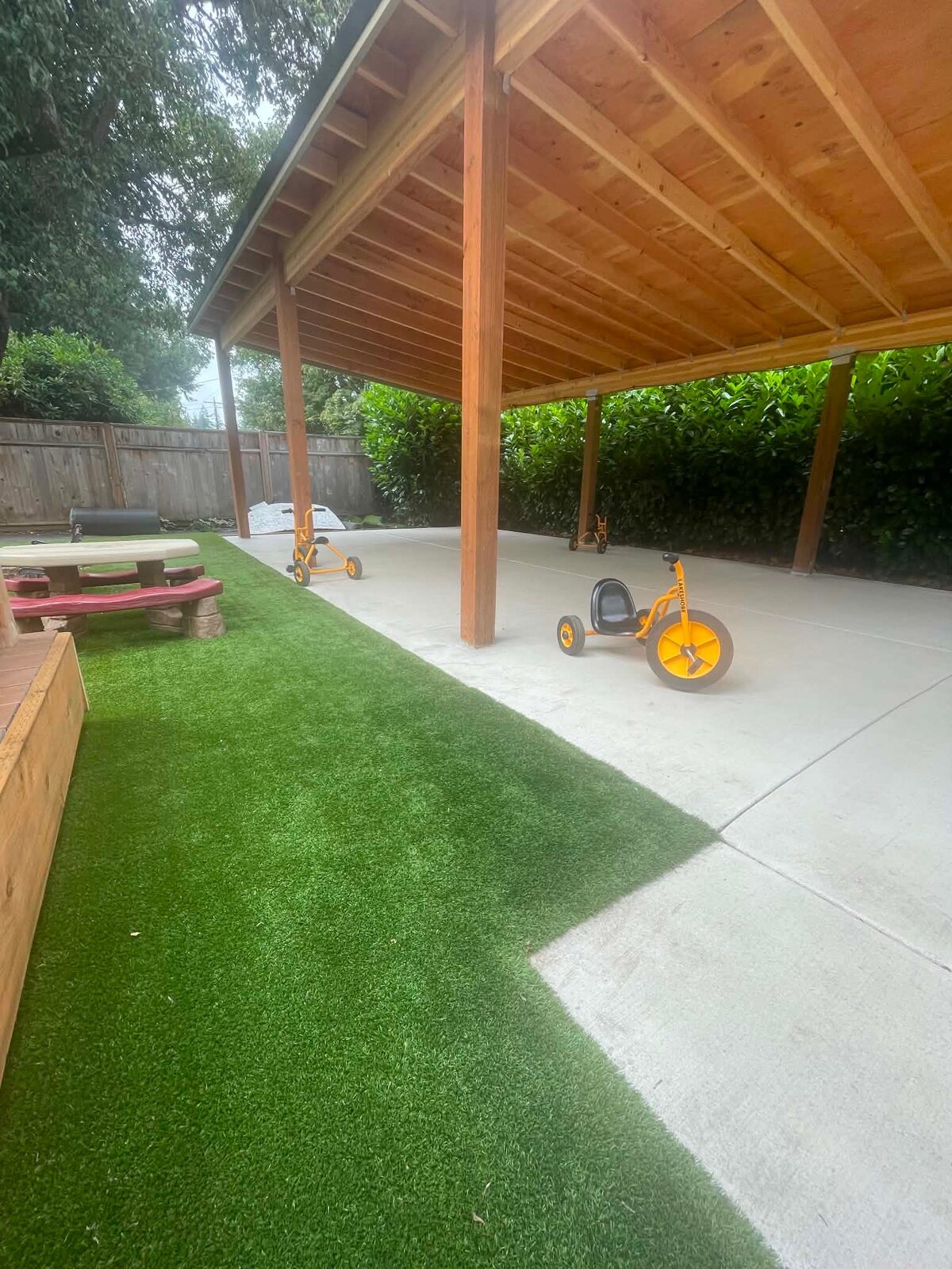 Covered play area at the SW Hensley location